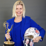 Portrait of Lisa Cagney Dixon holding her NFL helmet